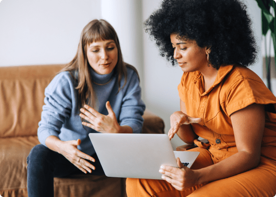 two women discussing strategies