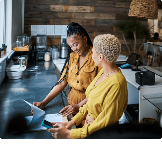 waitress and manager checking orders