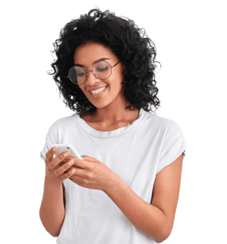 A woman in white top looking at her mobile