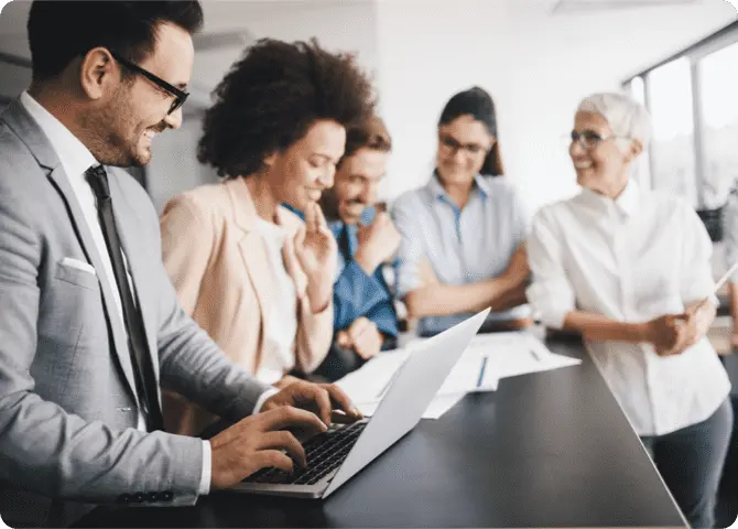 Group of professional people standing around table