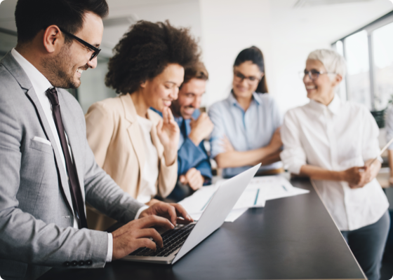 Group of professional people standing around table