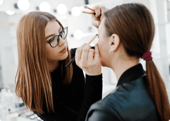 makeup artist doing client makeup setmore
