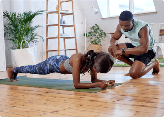 personal trainer training a client
