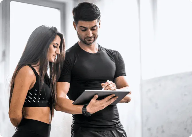 two people using an ipad to book appointment