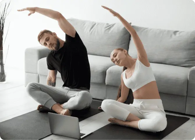 two people doing yoga sessions