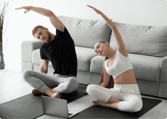 two people doing yoga sessions