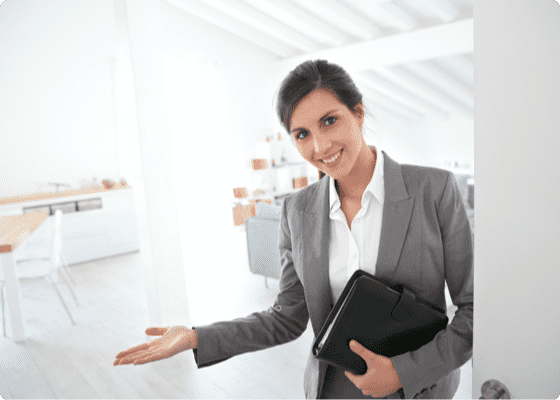 A woman in suit in welcoming pose