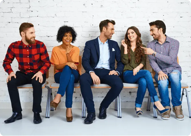 Group of people sitting in a queue and discussing