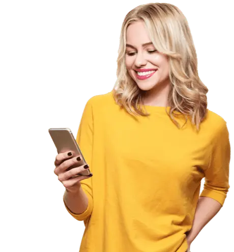 Woman in yellow top standing with her mobile