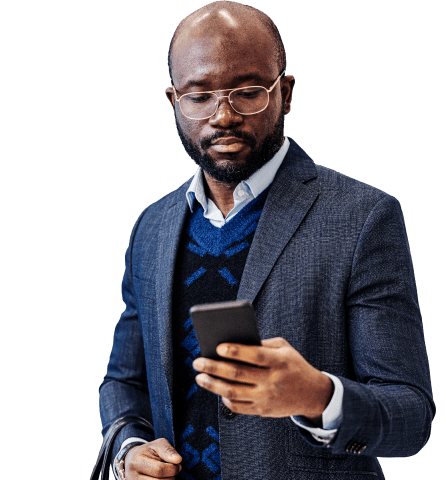 black men using his phone for online payment